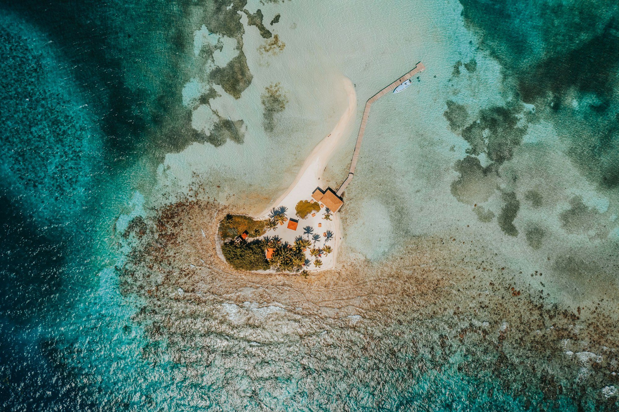 Aerial top view of the Goff's Caye island in the Caribbean Sea, Belize, Central America